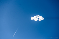 Falcon, Contrail Ring, and Moon